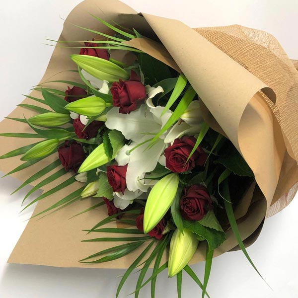 red rose and white lily flower bouquet